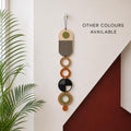 Handmade geometric wooden wall hanging by We Are Lunarium